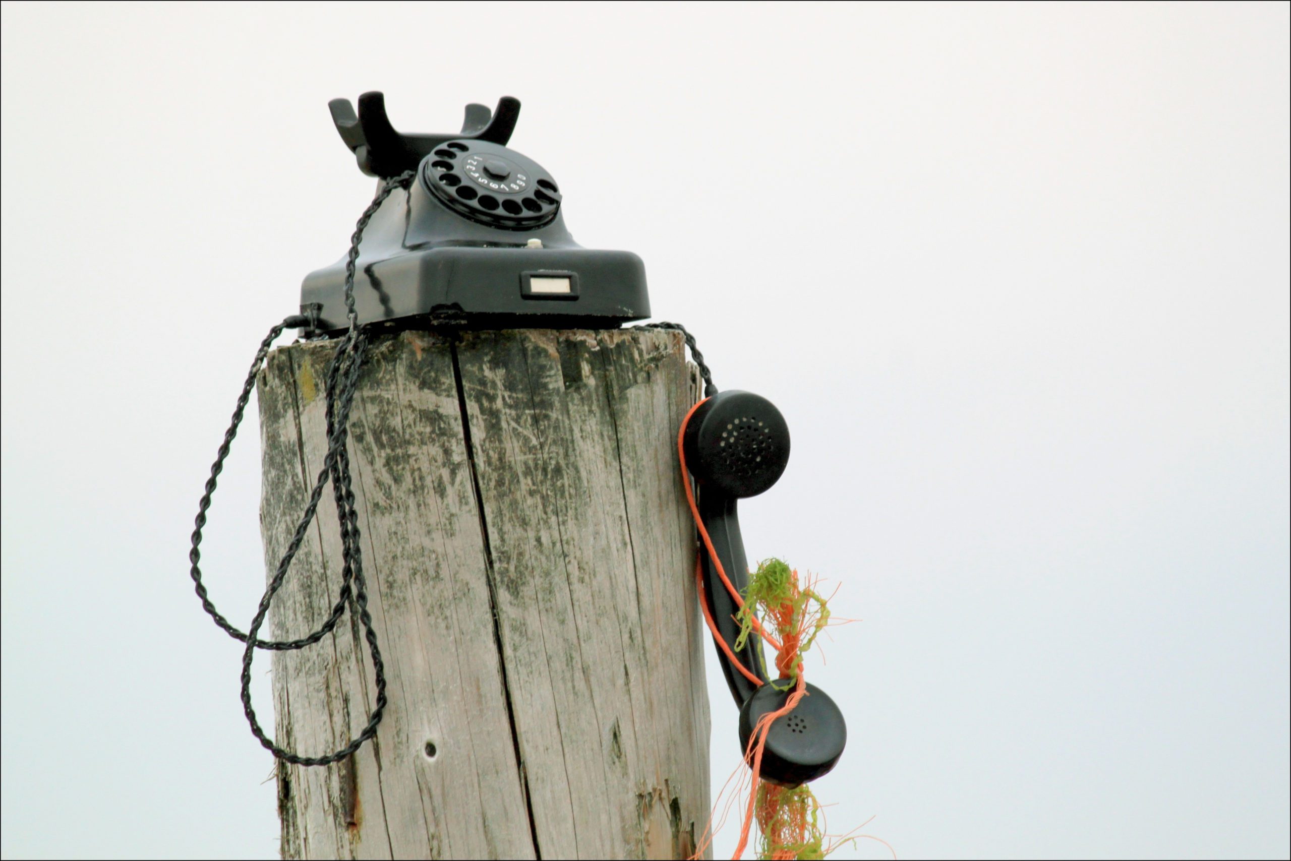 Canva-Old-Black-Telephone-Outdoors-scaled